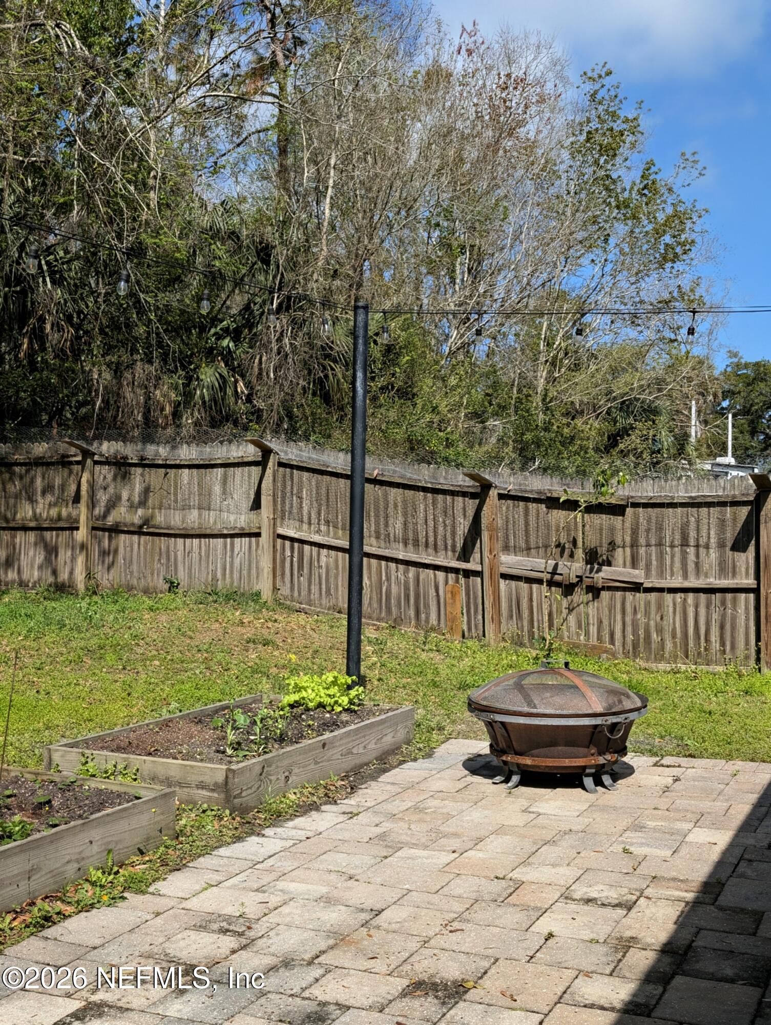 7 Arthur Street St. Augustine, FL 32084 - Photo 27 of 30 a view of a wooden deck with a bench