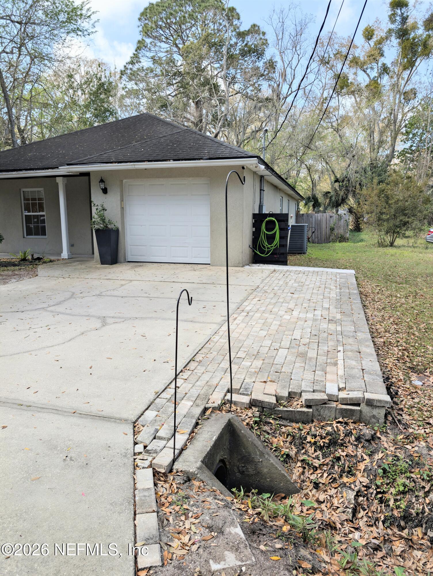 7 Arthur Street St. Augustine, FL 32084 - Photo 3 of 30 a front view of a house with garden