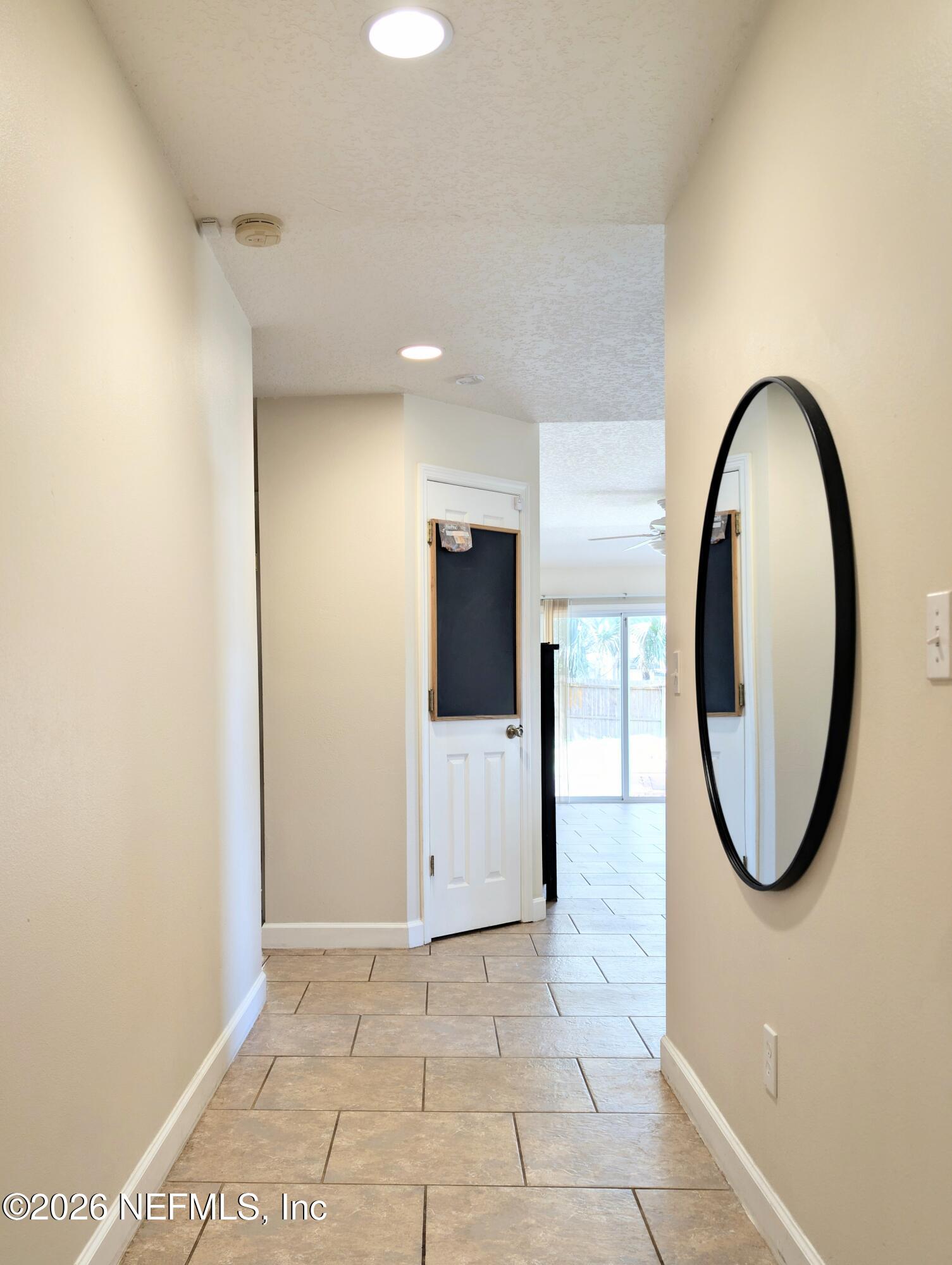 7 Arthur Street St. Augustine, FL 32084 - Photo 5 of 30 a view of a hallway with painted walls