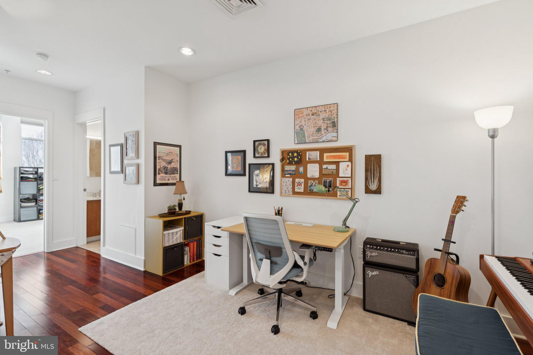 1101 Locust Street, Unit 3C Philadelphia, PA 19107 - Photo 18 of 28 a workspace with furniture and wooden floor
