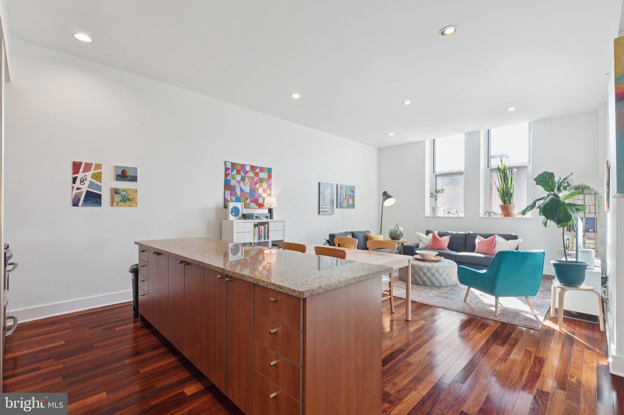 1101 Locust Street, Unit 3C Philadelphia, PA 19107 - Photo 8 of 28 a room with furniture and wooden floor
