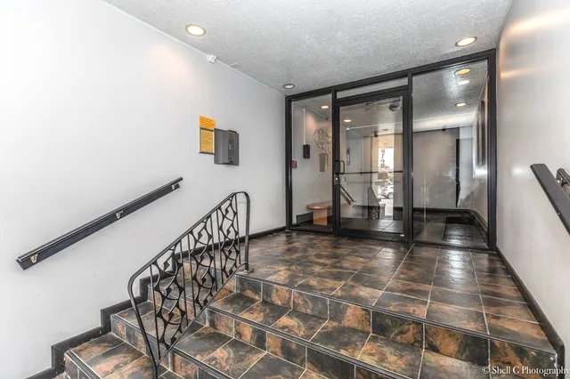 a view of entryway with wooden floor