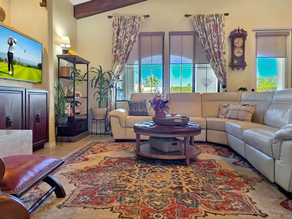 a bathroom with a bathtub and a window