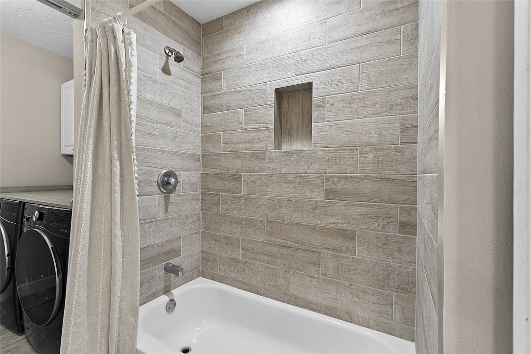 6366 5th Street Vero Beach, FL 32968 - Photo 27 of 36 a bathroom with a bathtub and shower