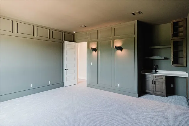 a view of a bathroom with a tub and shower