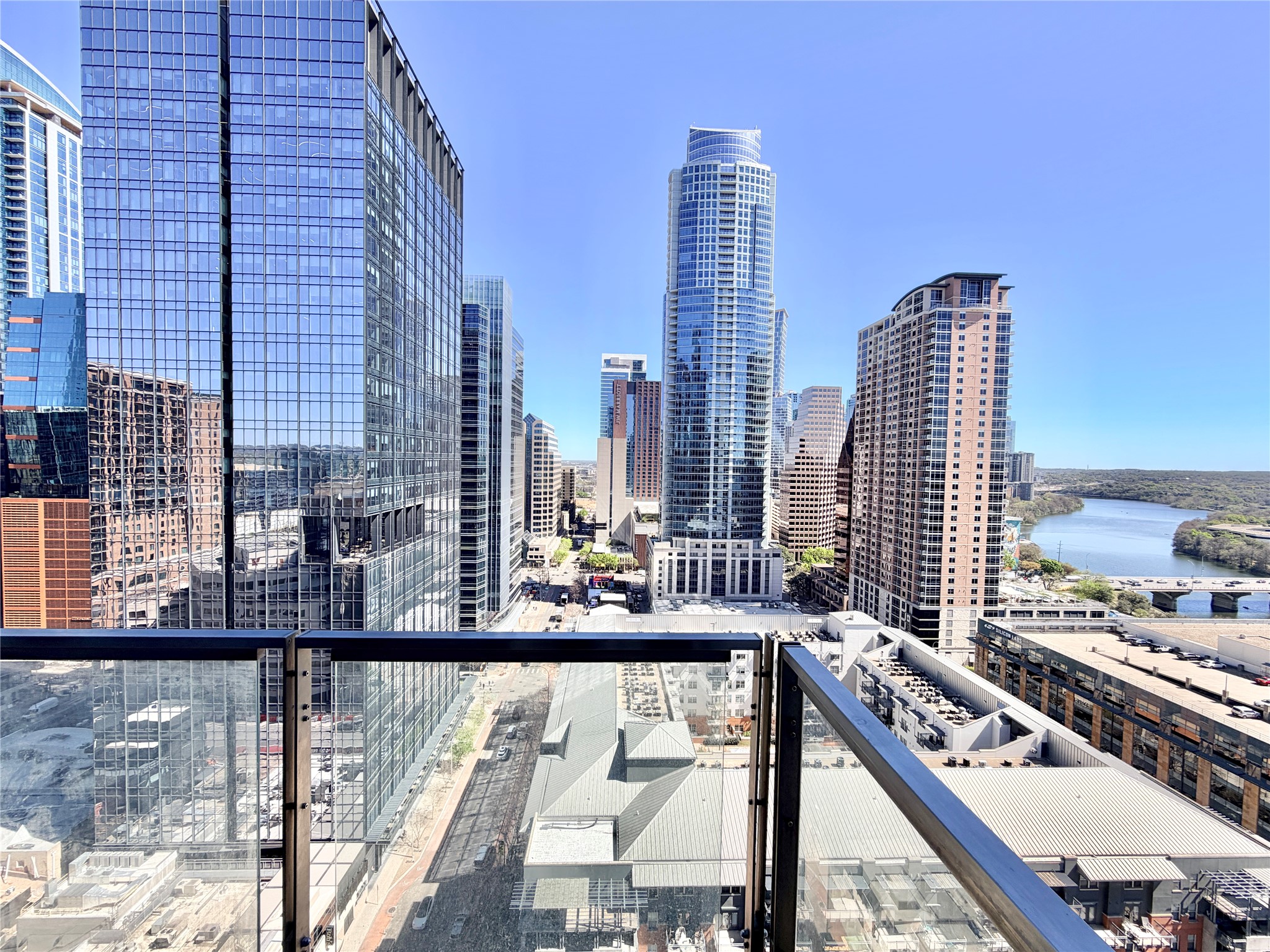 210 Lavaca Street, Unit 1912 Austin, TX 78701 - Photo 2 of 40 Balcony with a view of skyline and a water view