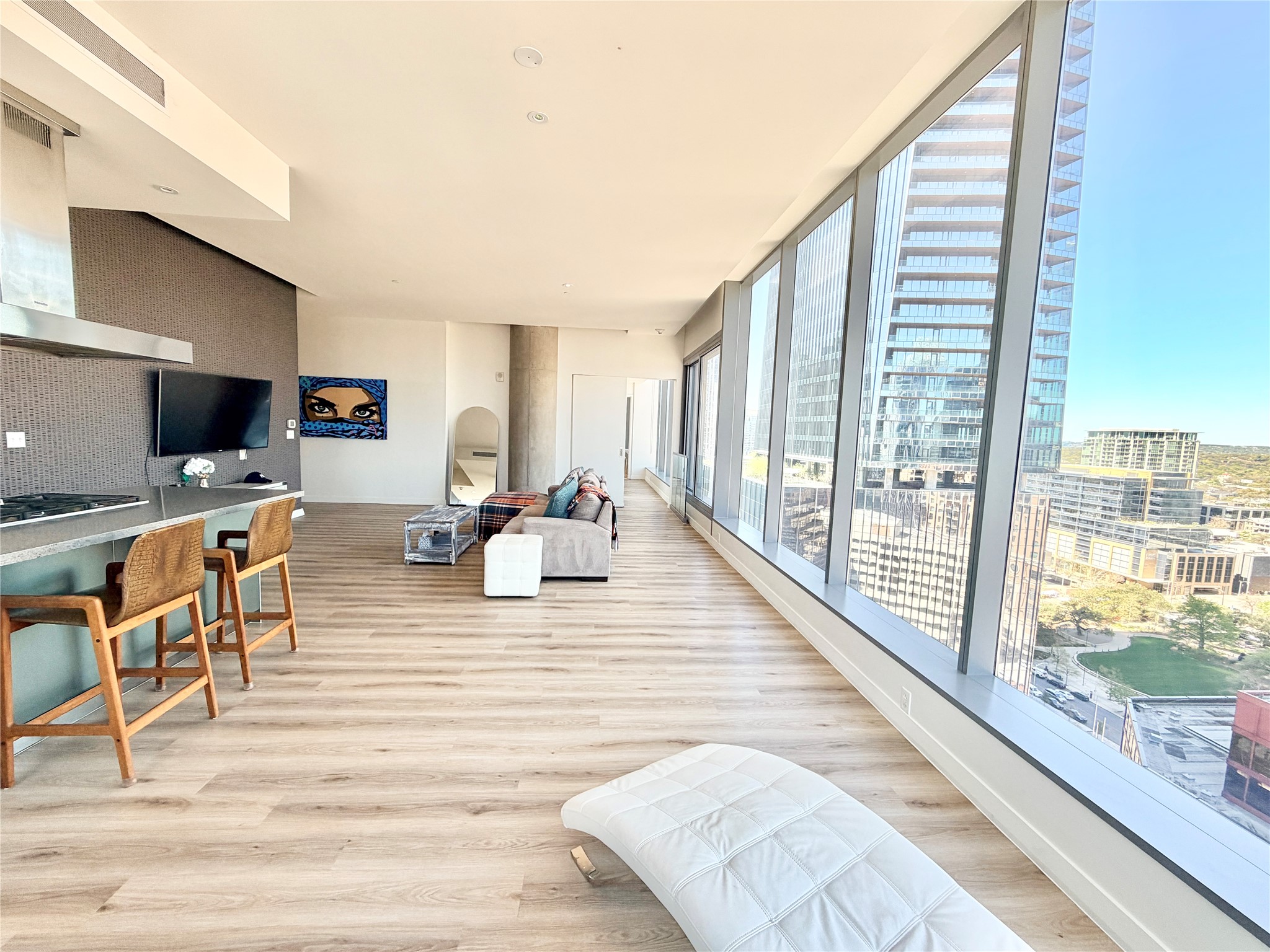 210 Lavaca Street, Unit 1912 Austin, TX 78701 - Photo 22 of 40 Living area with light wood finished floors