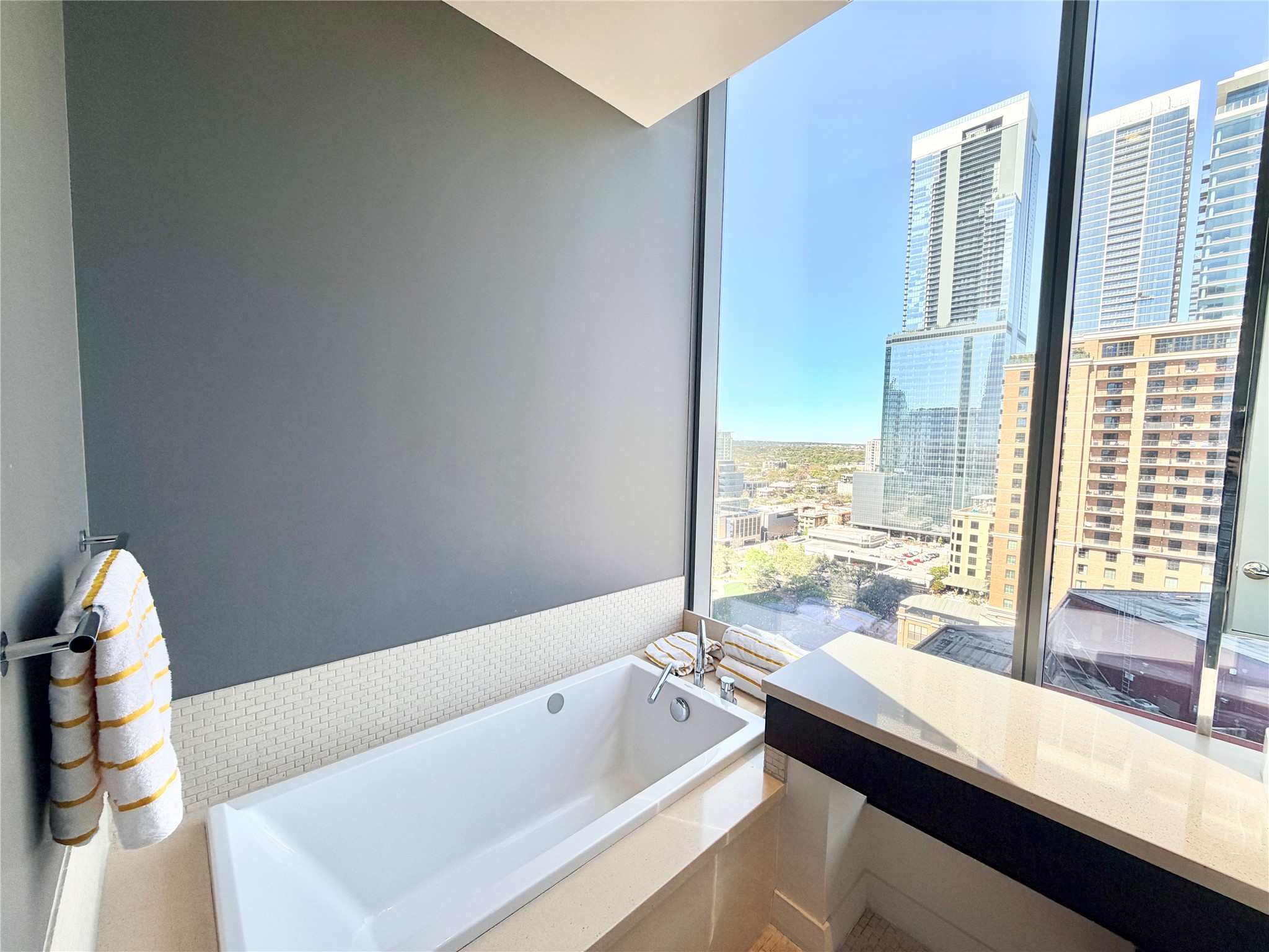 210 Lavaca Street, Unit 1912 Austin, TX 78701 - Photo 30 of 40 Full bathroom with a garden tub and a view of city