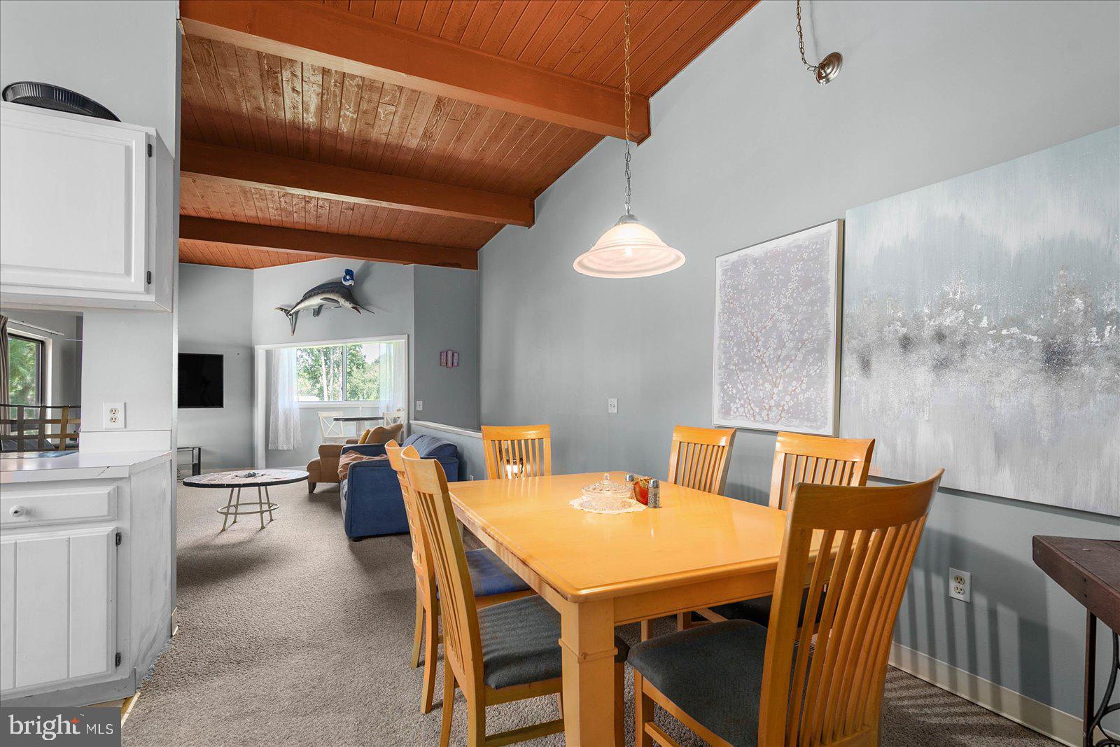 438 Ocean Parkway, Unit 35 Ocean Pines, MD 21811 - Photo 16 of 99 a view of a dining room with furniture window and wooden floor