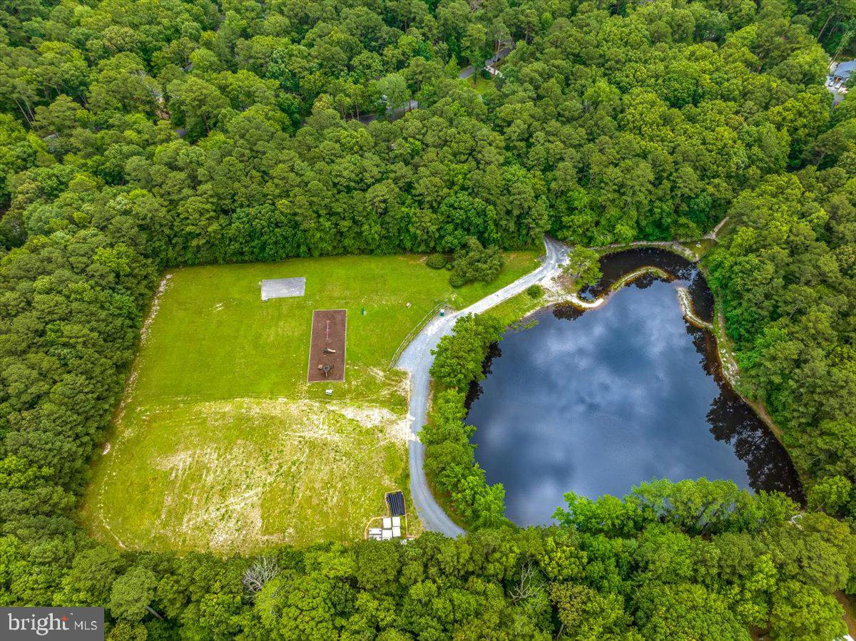 438 Ocean Parkway, Unit 35 Ocean Pines, MD 21811 - Photo 49 of 99 a view of a back yard of the house