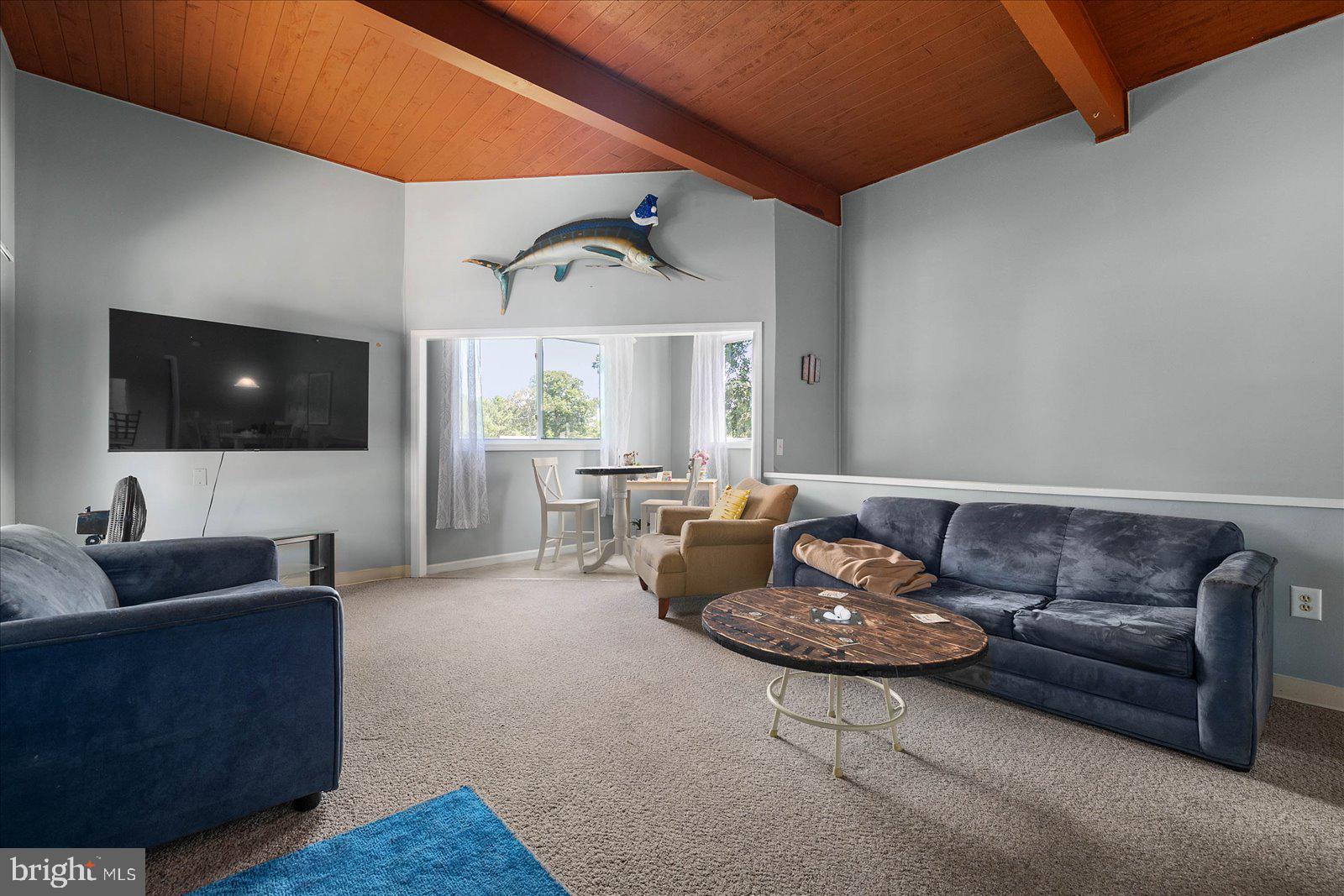 438 Ocean Parkway, Unit 35 Ocean Pines, MD 21811 - Photo 8 of 99 a living room with furniture and a flat screen tv