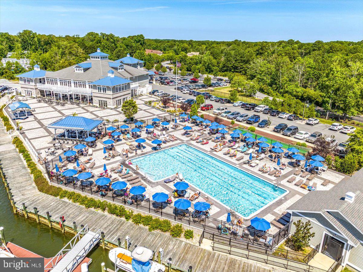 438 Ocean Parkway, Unit 35 Ocean Pines, MD 21811 - Photo 98 of 99 an aerial view of residential houses with outdoor space and swimming pool