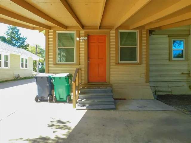 front view of a house with a patio