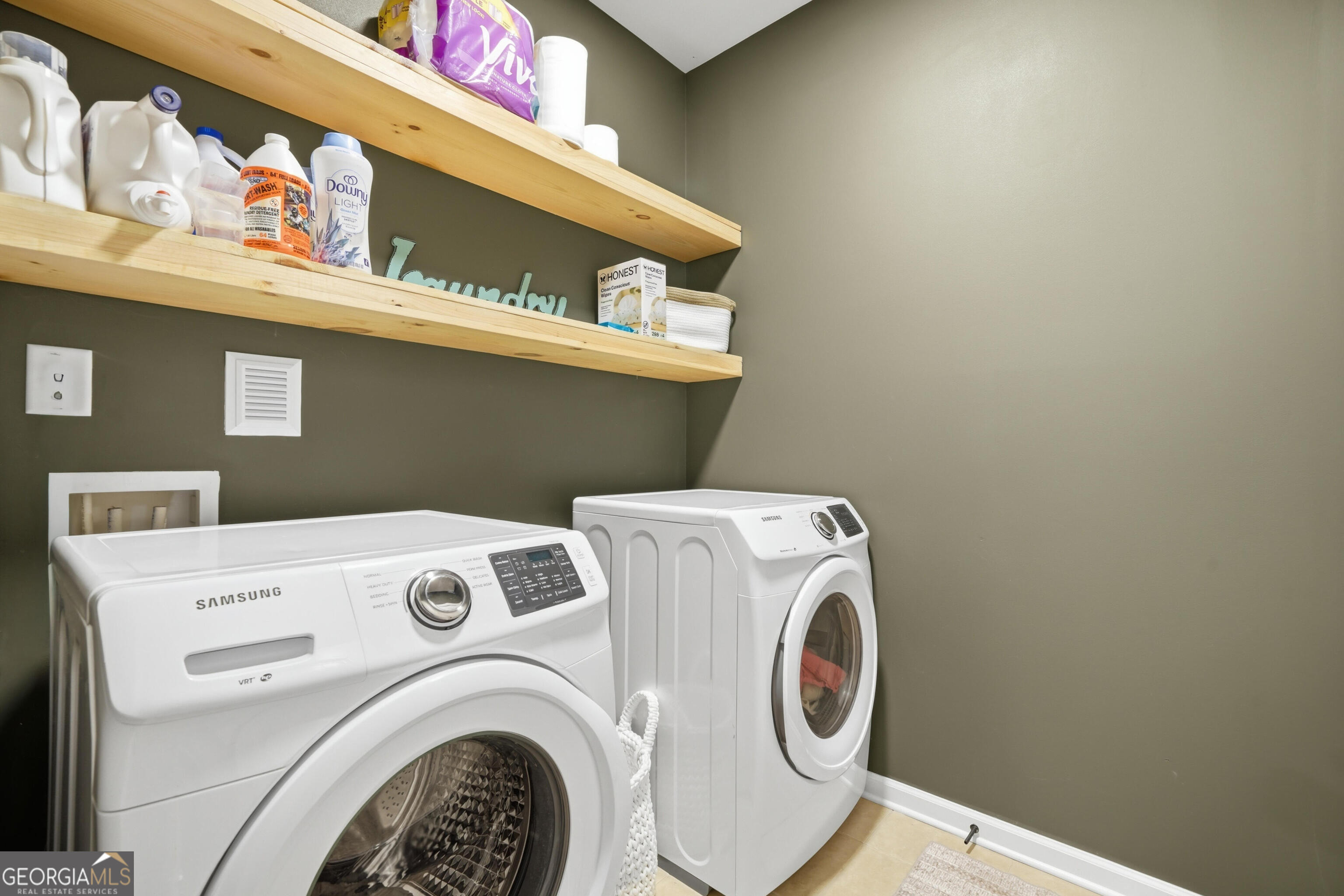 301 Stoney Hollow Road Canton, GA 30114 - Photo 16 of 47 a utility room with dryer and washer
