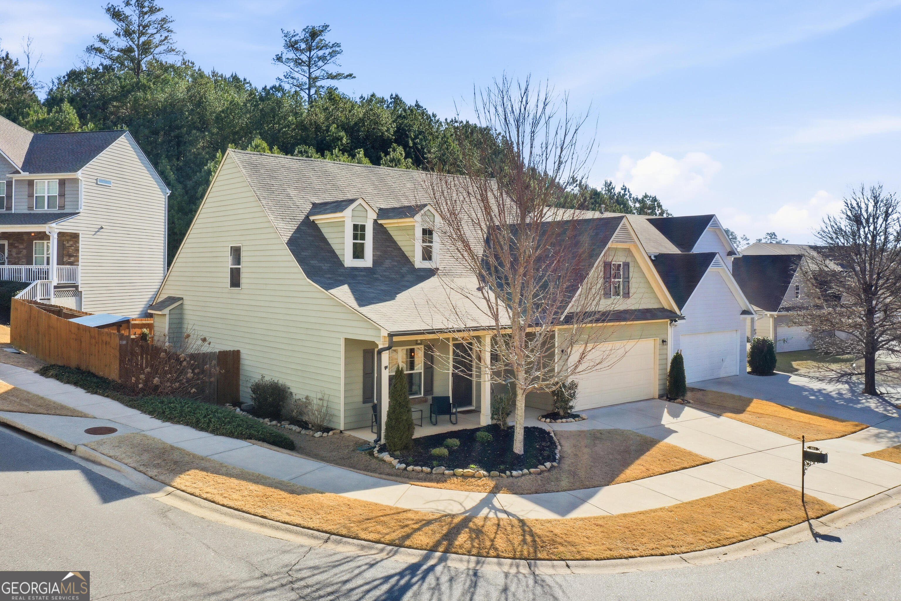 301 Stoney Hollow Road Canton, GA 30114 - Photo 2 of 47 a view of a house with backyard and sitting area