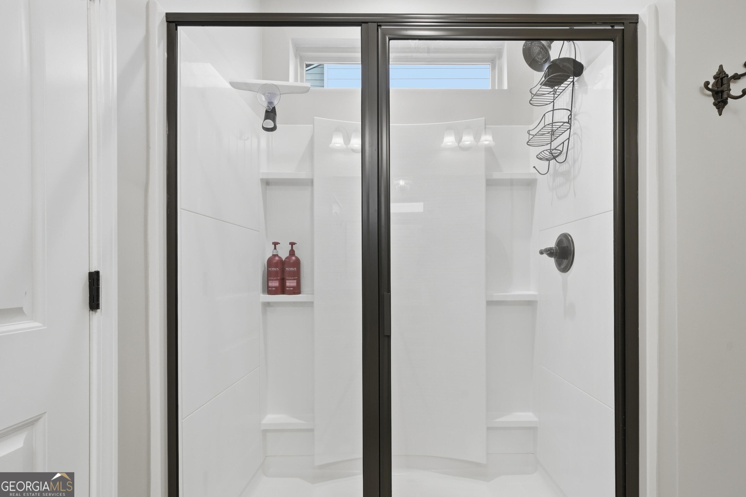 301 Stoney Hollow Road Canton, GA 30114 - Photo 31 of 47 a bathroom with a shower