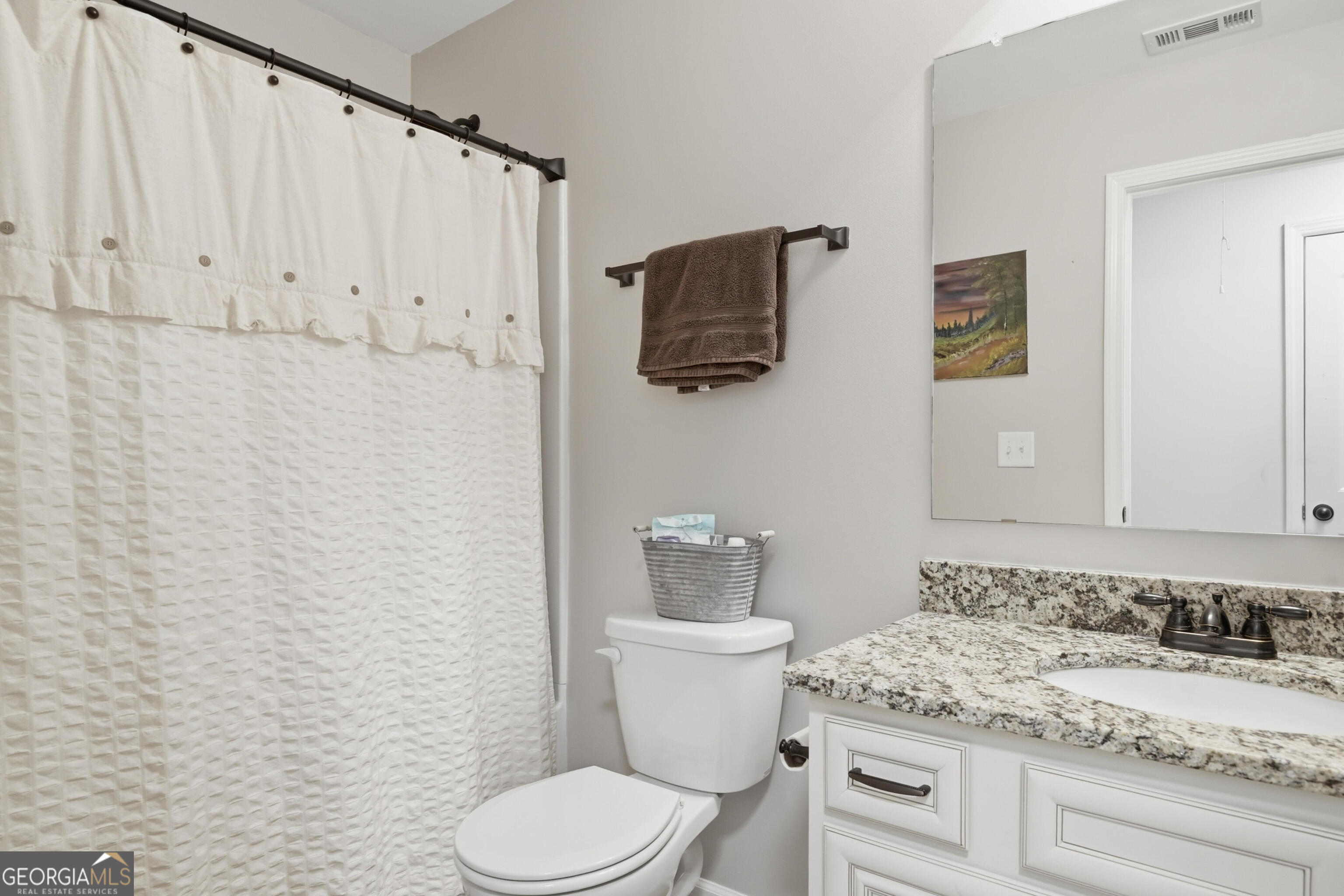 301 Stoney Hollow Road Canton, GA 30114 - Photo 38 of 47 a bathroom with a granite countertop sink and a toilet