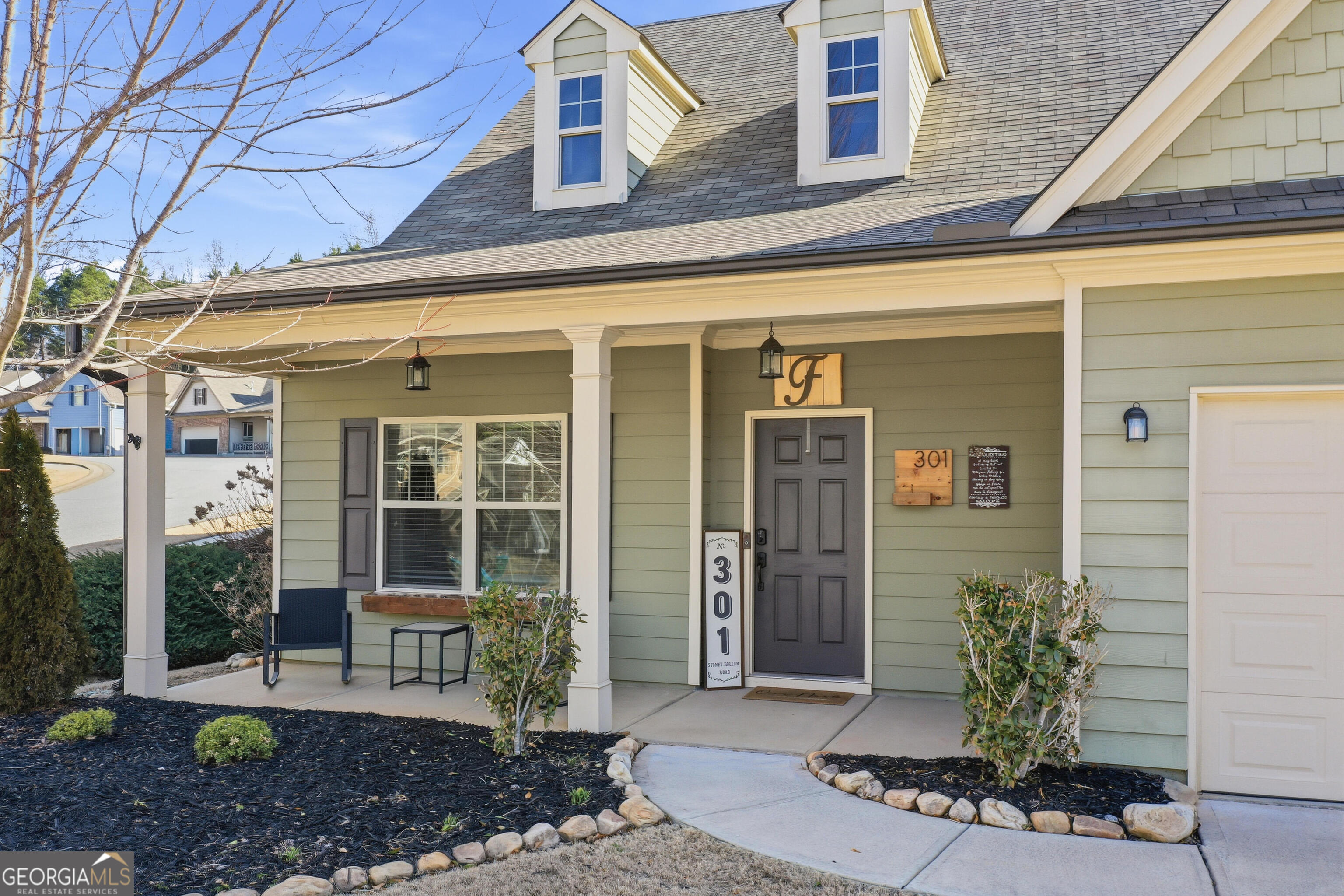 301 Stoney Hollow Road Canton, GA 30114 - Photo 4 of 47 a front view of a house