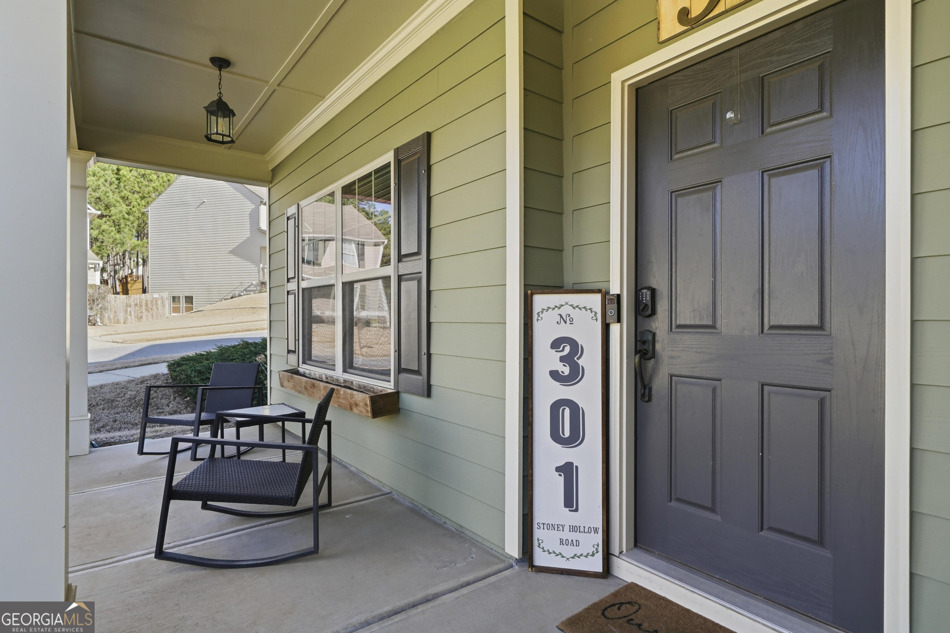 301 Stoney Hollow Road Canton, GA 30114 - Photo 5 of 47 a building outdoor space with patio furniture