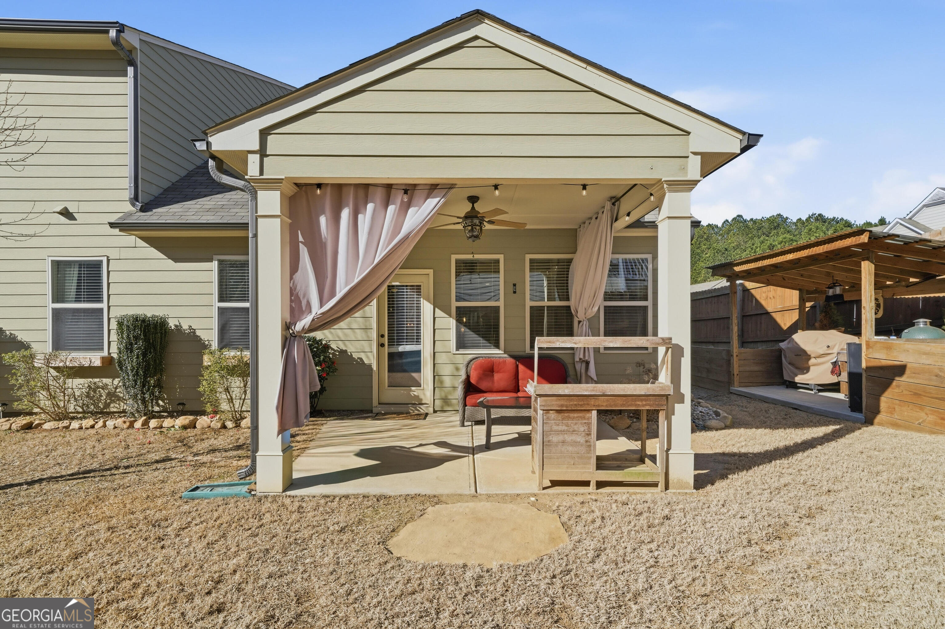 301 Stoney Hollow Road Canton, GA 30114 - Photo 8 of 47 a front view of a house with a porch