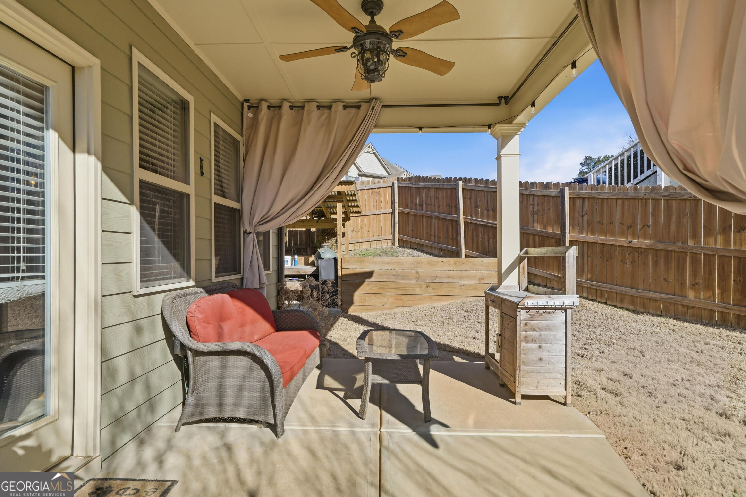 301 Stoney Hollow Road Canton, GA 30114 - Photo 9 of 47 a balcony with table and chairs