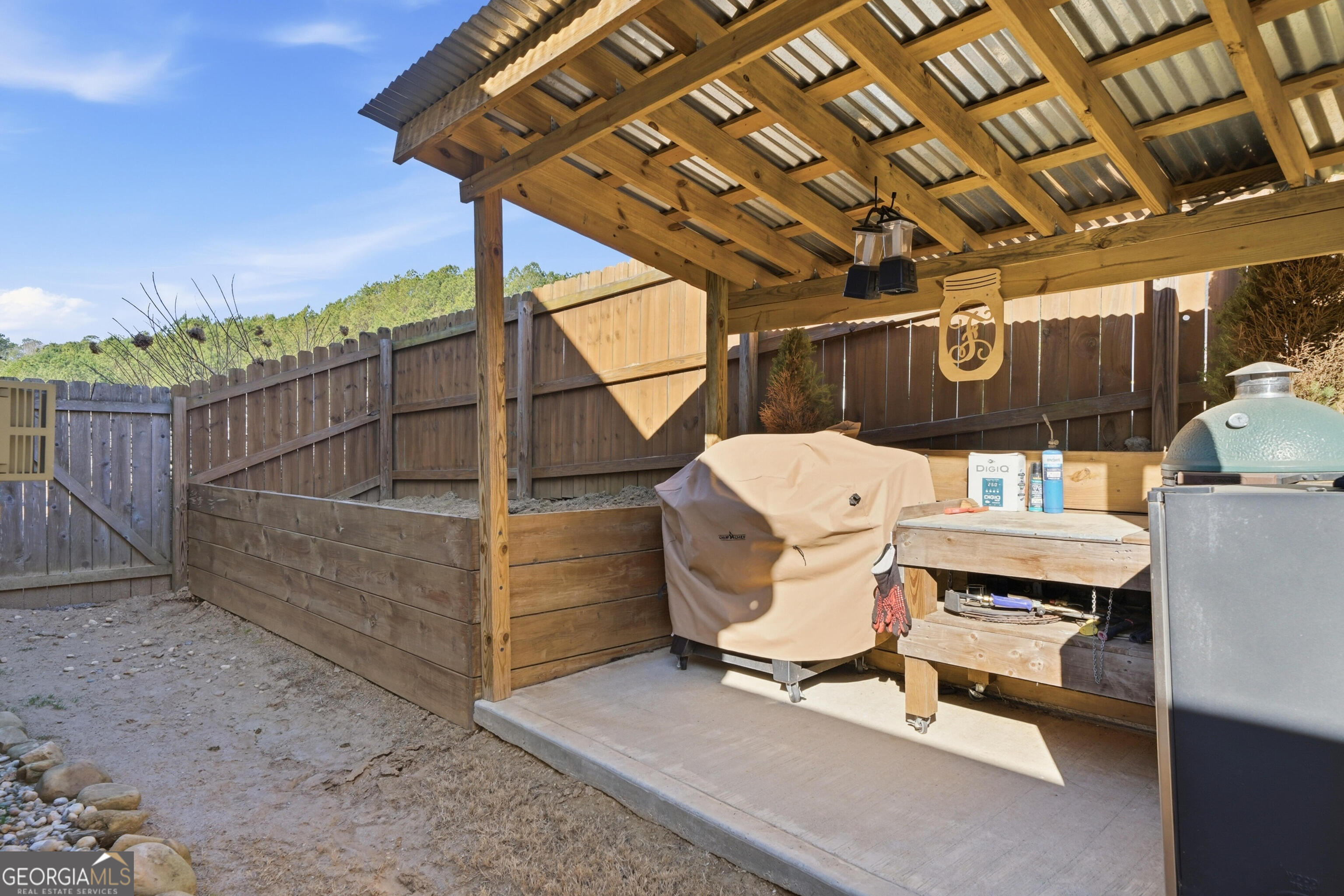301 Stoney Hollow Road Canton, GA 30114 - Photo 10 of 47 a roof deck with table and chairs