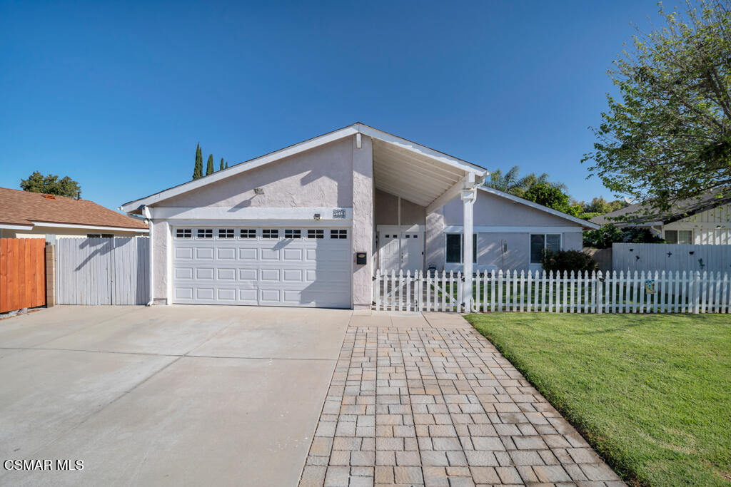 2353 Bryson Place Simi Valley, CA 93065 - Photo 1 of 31 a front view of a house with a garden