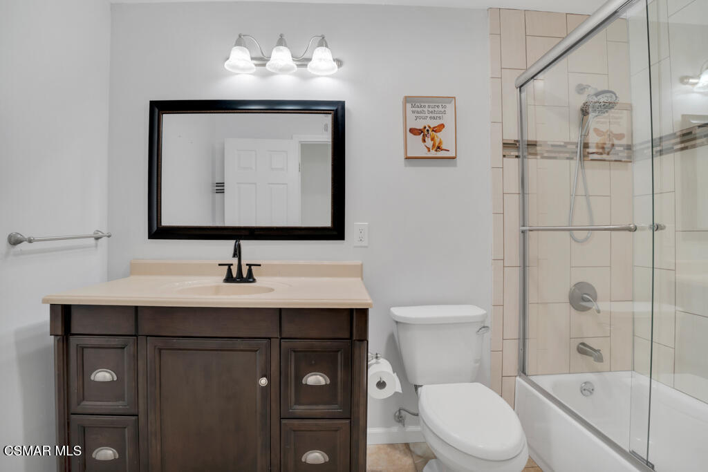 2353 Bryson Place Simi Valley, CA 93065 - Photo 18 of 31 a bathroom with a toilet sink and mirror