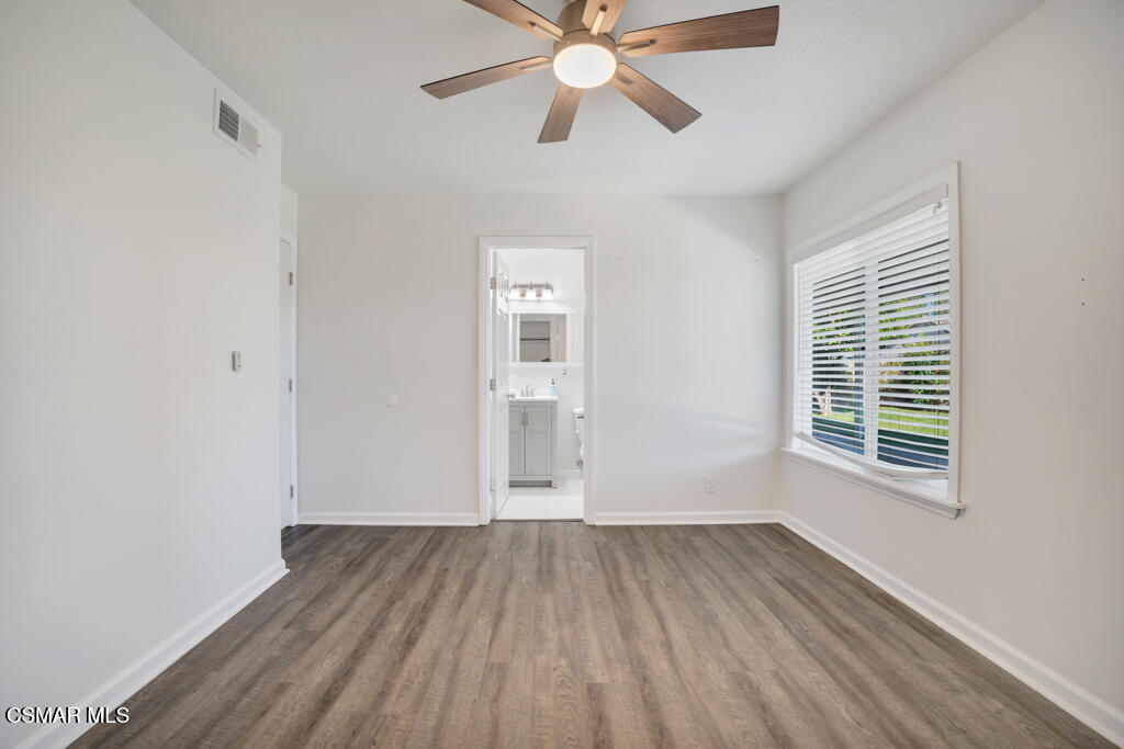 2353 Bryson Place Simi Valley, CA 93065 - Photo 20 of 31 a view of empty room with wooden floor and fan