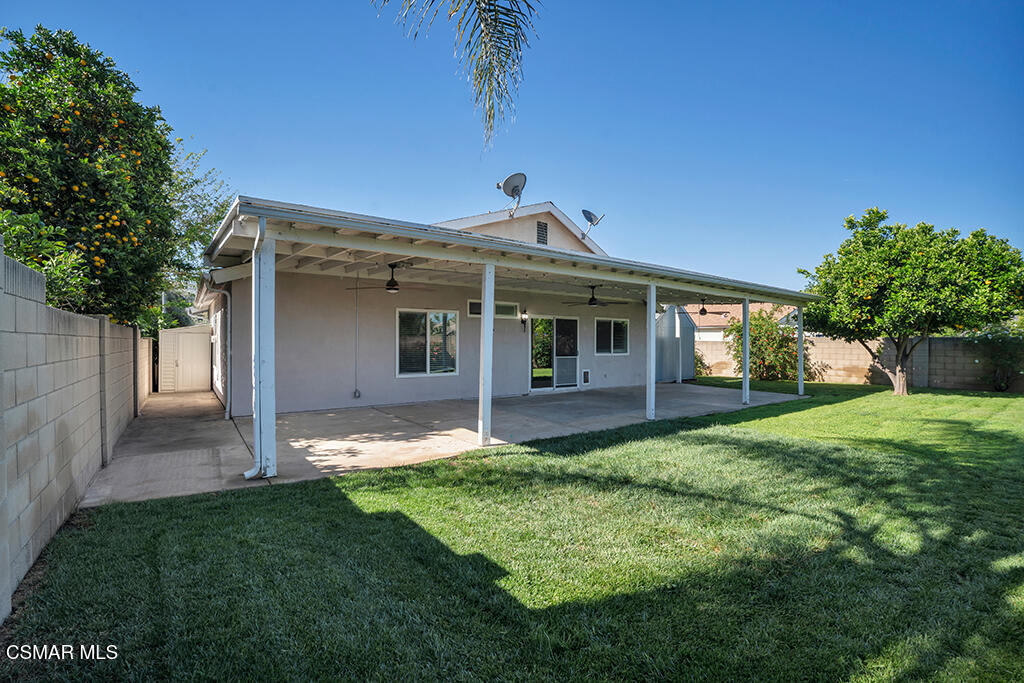 2353 Bryson Place Simi Valley, CA 93065 - Photo 24 of 31 a view of a house with a yard and potted plants