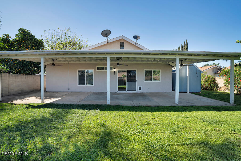 2353 Bryson Place Simi Valley, CA 93065 - Photo 26 of 31 a front view of a house with a yard