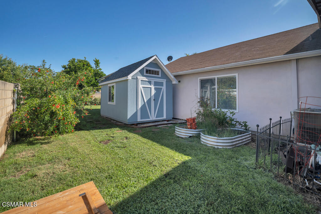 2353 Bryson Place Simi Valley, CA 93065 - Photo 28 of 31 a front view of house with yard and green space