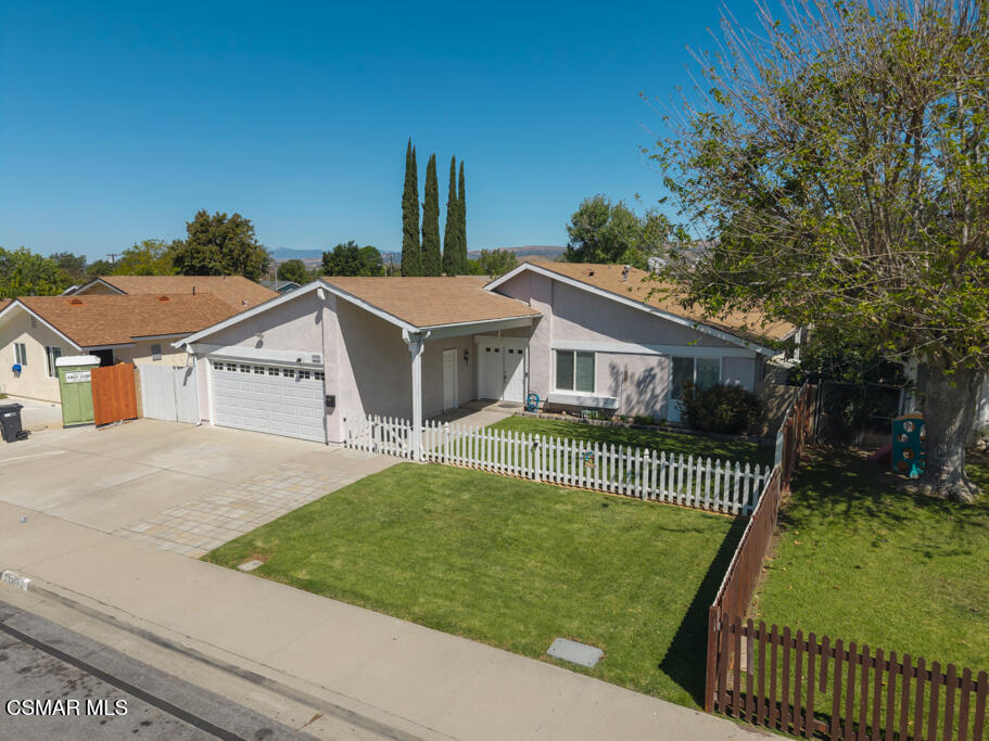 2353 Bryson Place Simi Valley, CA 93065 - Photo 29 of 31 a front view of a house with a garden and yard