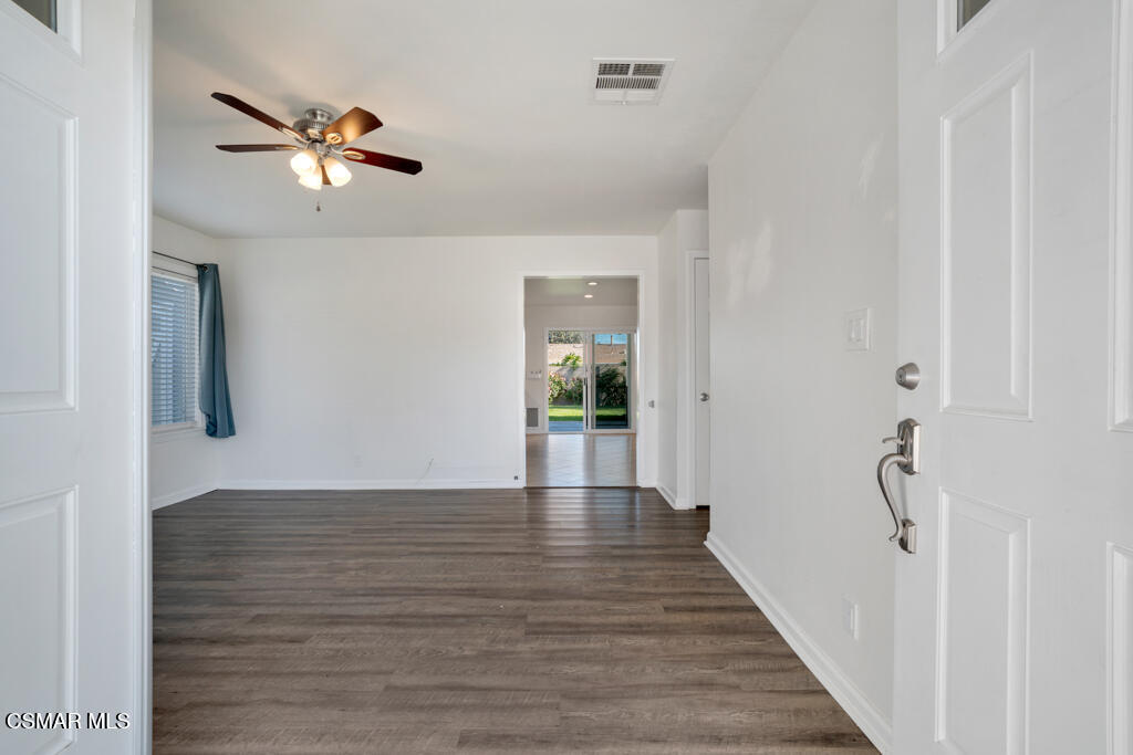 2353 Bryson Place Simi Valley, CA 93065 - Photo 5 of 31 a view of a hallway with wooden floor and staircase
