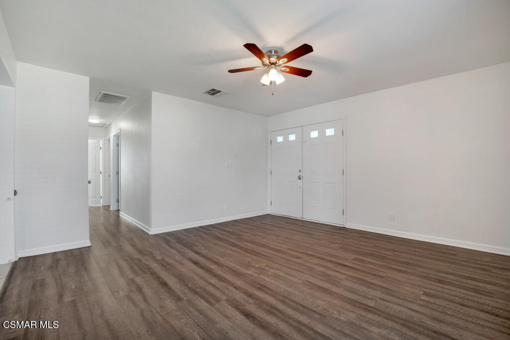2353 Bryson Place Simi Valley, CA 93065 - Photo 7 of 31 a view of an empty room with wooden floor