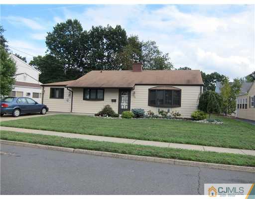 22 Fairfax Road Edison, NJ 08817 - Photo 1 of 8 a front view of a house with a yard