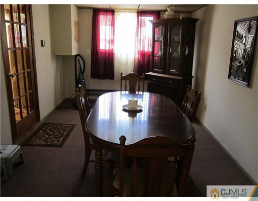 22 Fairfax Road Edison, NJ 08817 - Photo 4 of 8 a dining room with furniture and window