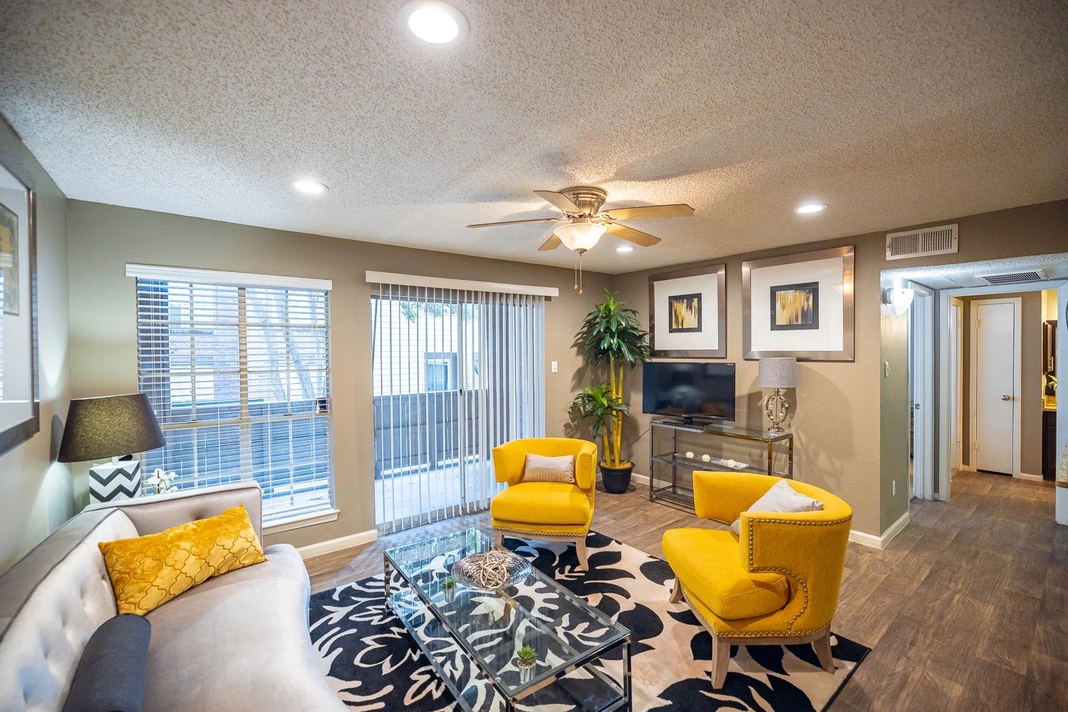 1773 Wells Branch Parkway, Unit 1018 Austin, TX 78728 - Photo 16 of 21 a living room with furniture and a table