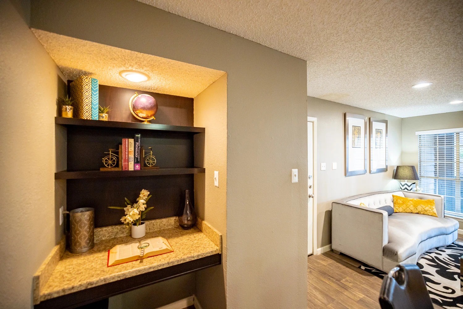 1773 Wells Branch Parkway, Unit 1018 Austin, TX 78728 - Photo 17 of 21 a view of a room with wooden floor and furniture