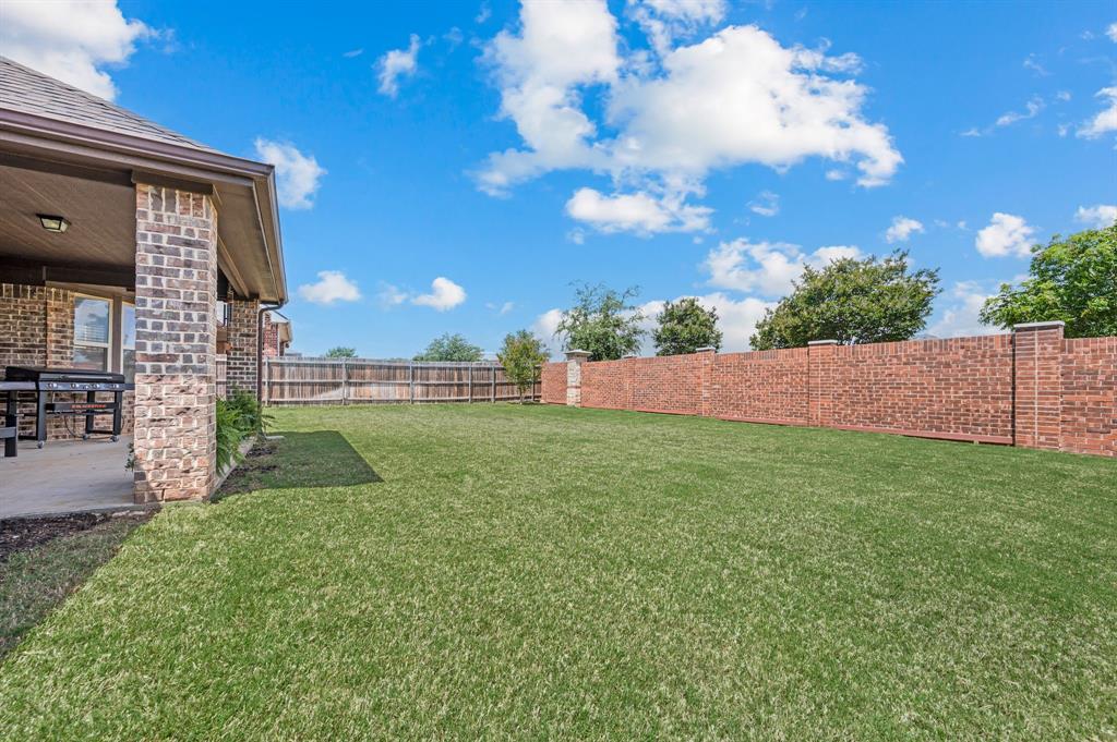 5209 Edgebrook Way Fort Worth, TX 76244 - Photo 27 of 33 a view of yard with trampoline