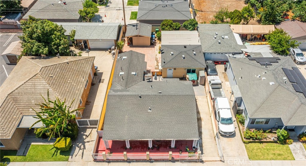 6824 Marcelle Street Paramount, CA 90723 - Photo 14 of 46 an aerial view of residential houses with outdoor space