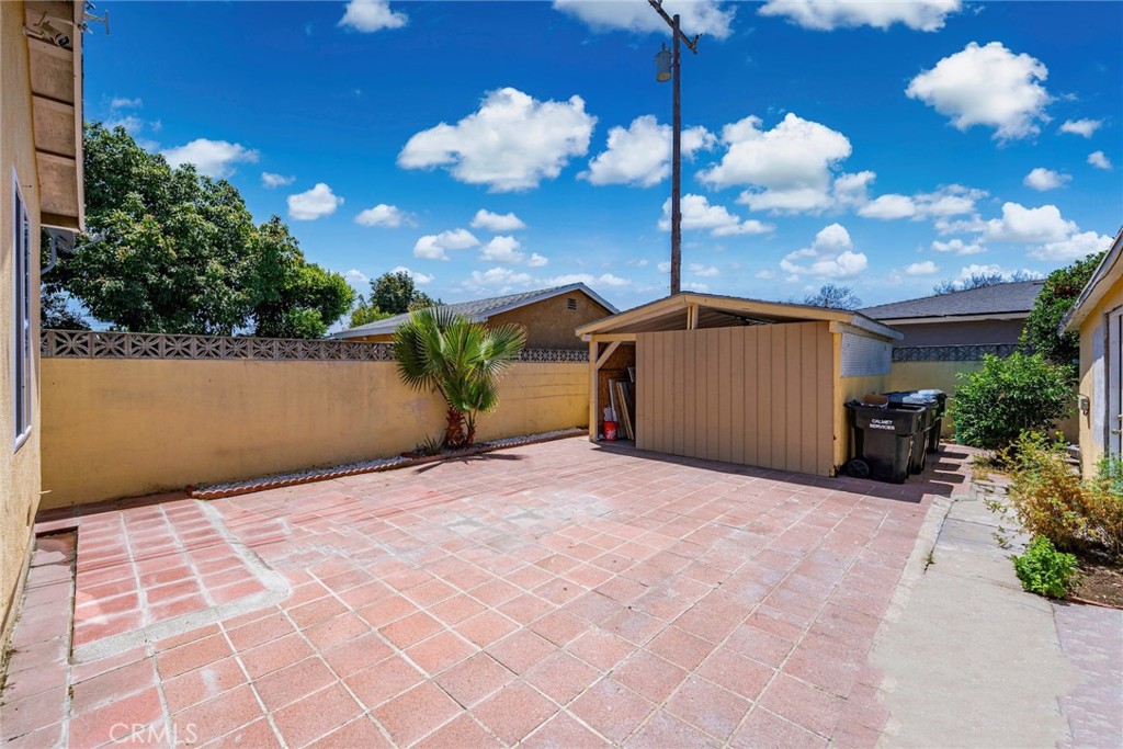 6824 Marcelle Street Paramount, CA 90723 - Photo 24 of 46 a view of a backyard of the house