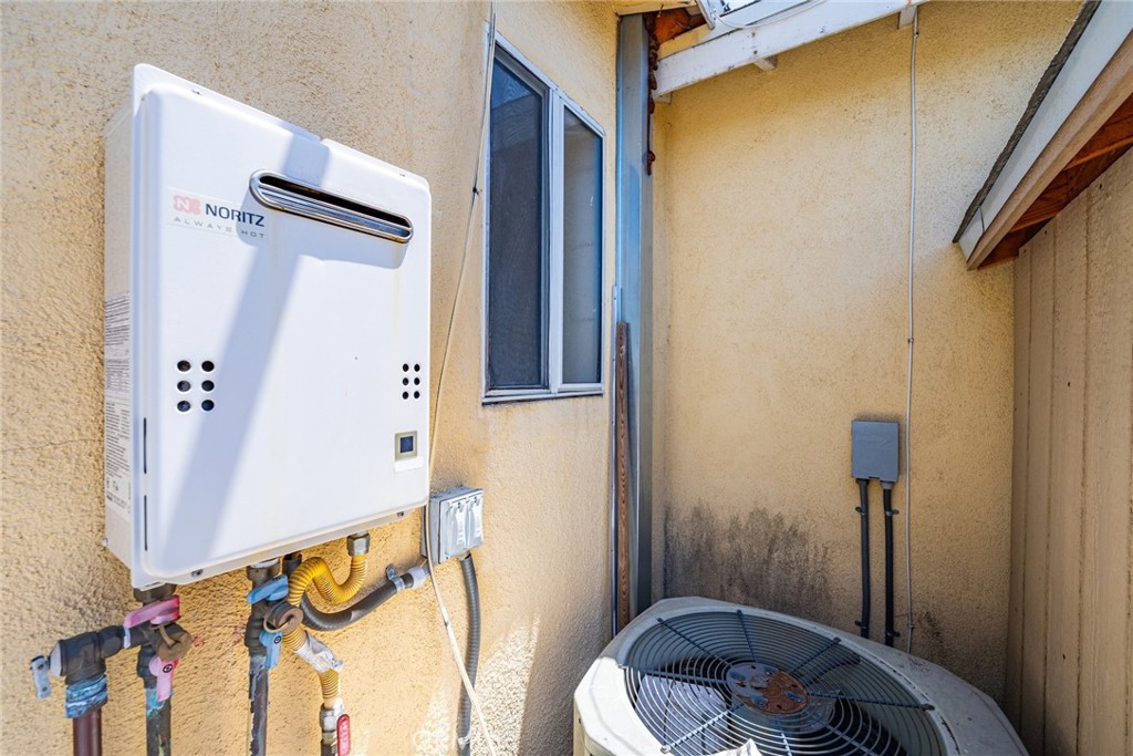 6824 Marcelle Street Paramount, CA 90723 - Photo 27 of 46 a bathroom with a sink and a mirror
