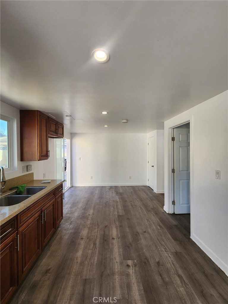 6824 Marcelle Street Paramount, CA 90723 - Photo 32 of 46 a view of a kitchen counter space and wooden floor