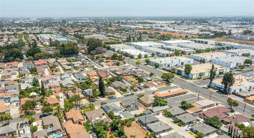 6824 Marcelle Street Paramount, CA 90723 - Photo 42 of 46 an aerial view of residential houses with outdoor space