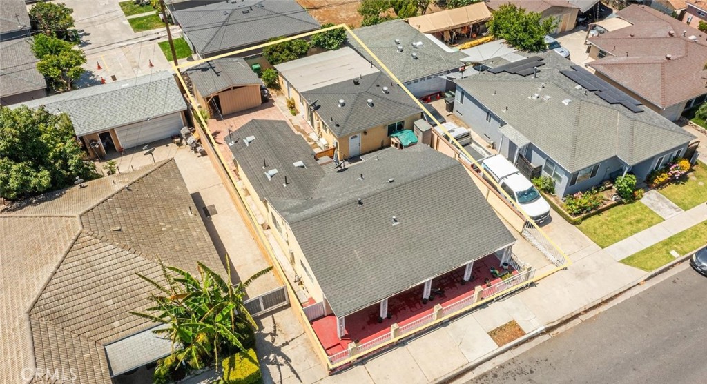 6824 Marcelle Street Paramount, CA 90723 - Photo 9 of 46 an aerial view of residential houses with outdoor space