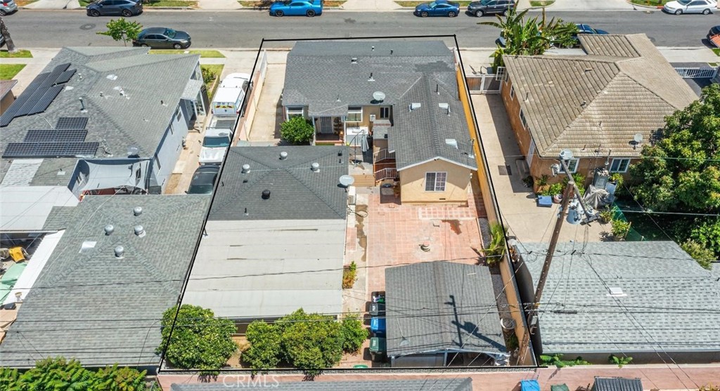 6824 Marcelle Street Paramount, CA 90723 - Photo 10 of 46 an aerial view of residential houses with outdoor space