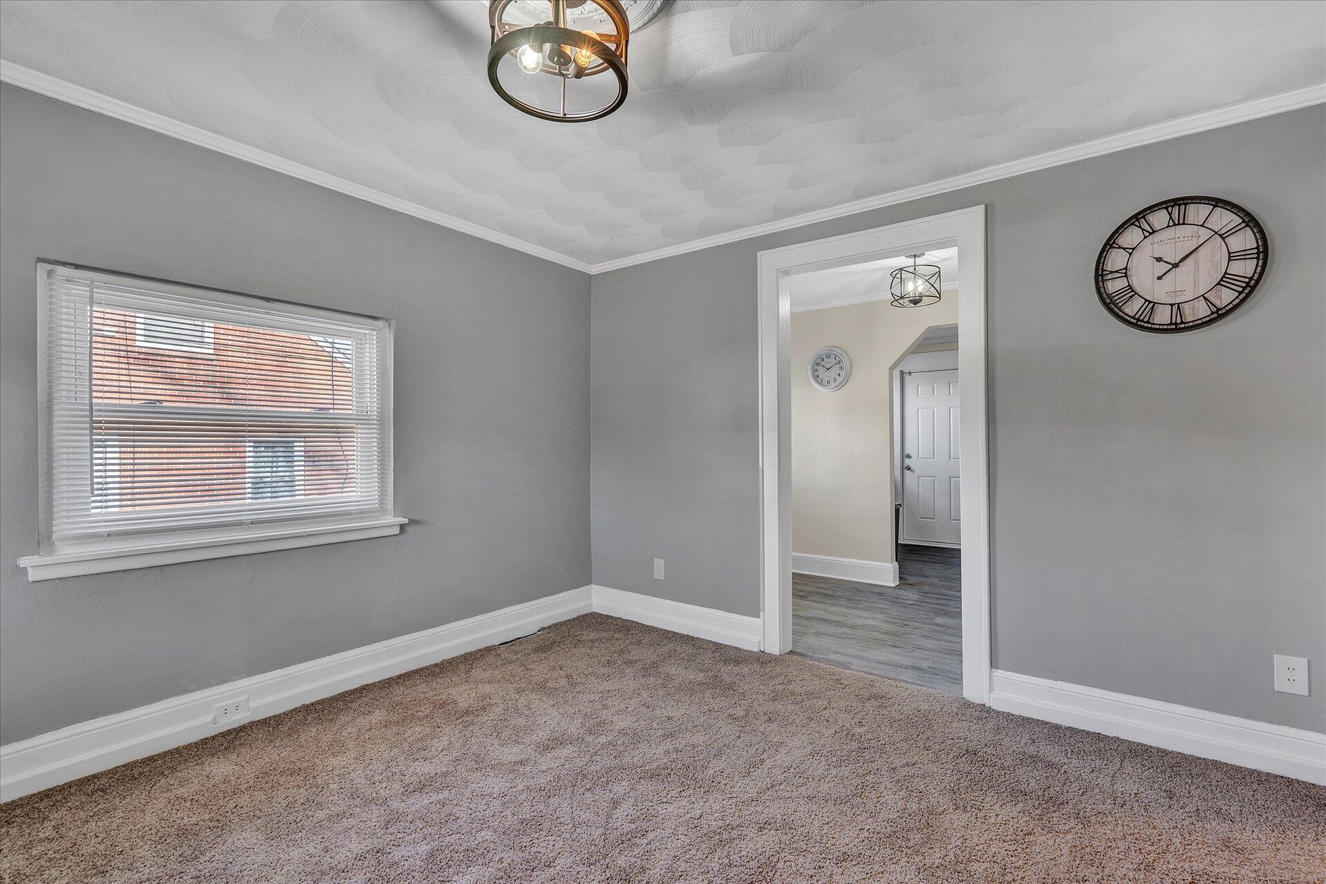 1329 Peters Creek Road Roanoke, VA 24017 - Photo 11 of 27 an empty room with a window