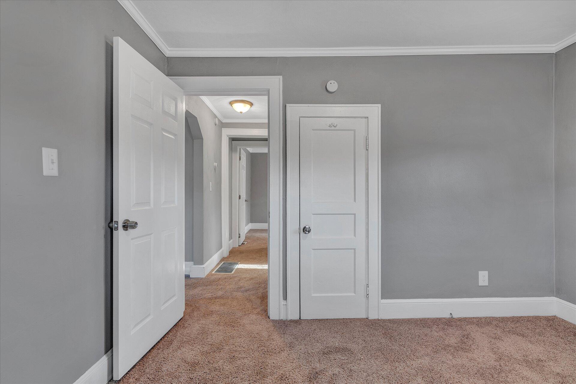 1329 Peters Creek Road Roanoke, VA 24017 - Photo 14 of 27 wooden view of a hallway with closet area
