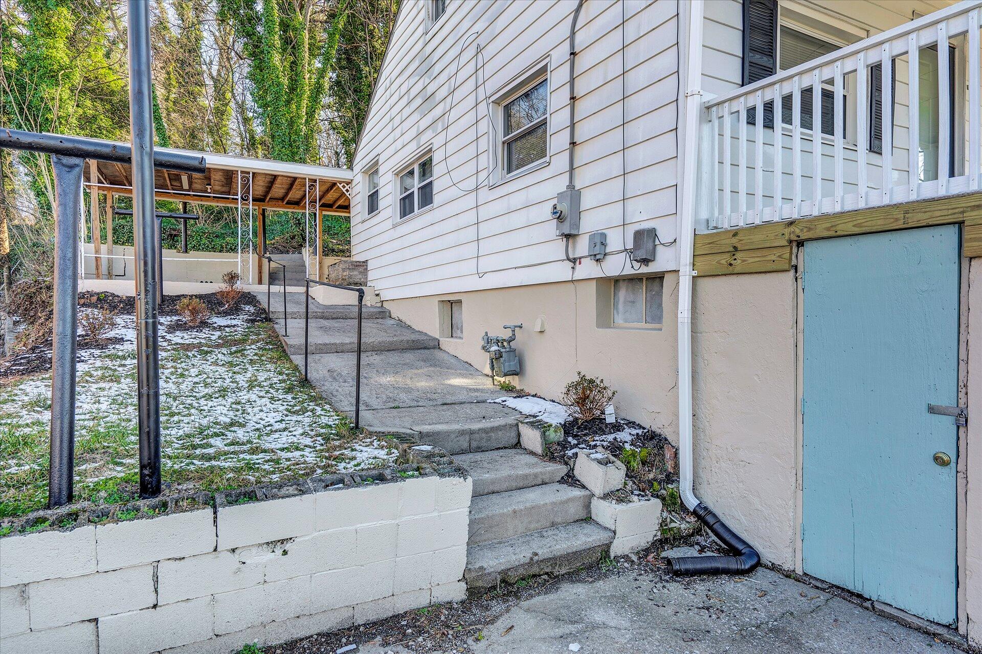 1329 Peters Creek Road Roanoke, VA 24017 - Photo 25 of 27 a view of a house with a patio